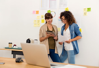 Image showing Two businesswoman working together