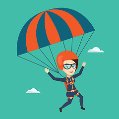 Image showing Young happy woman flying with parachute.