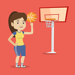 Image showing Young basketball player spinning ball.