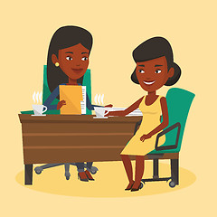 Image showing Two businesswomen during business meeting.