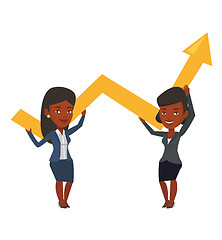 Image showing Two businesswomen holding growth graph.