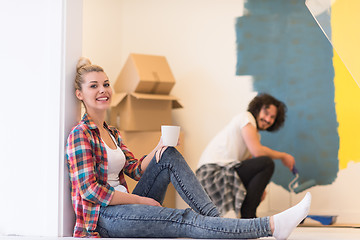 Image showing young couple doing home renovations