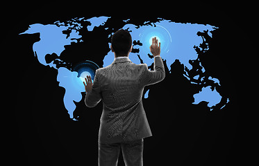 Image showing businessman working with virtual world map