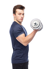 Image showing sportive young man with dumbbell