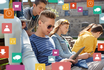 Image showing group of students with tablet pc outdoors