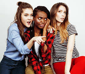 Image showing diverse multi nation girls group, teenage friends company cheerful having fun, happy smiling, cute posing isolated on white background, lifestyle people concept, african-american and caucasian 