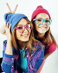 Image showing best friends teenage girls together having fun, posing emotional on white background, besties happy smiling, lifestyle people concept close up. making selfie