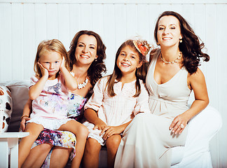 Image showing Mature sisters twins at home with little daughter, happy family