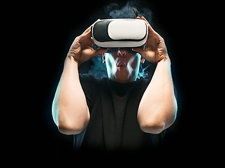 Image showing The man with glasses of virtual reality. Future technology concept.