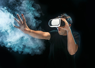 Image showing The man with glasses of virtual reality. Future technology concept.