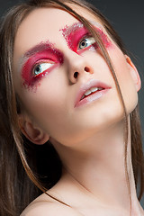 Image showing Beautiful woman face portrait close up with red make up