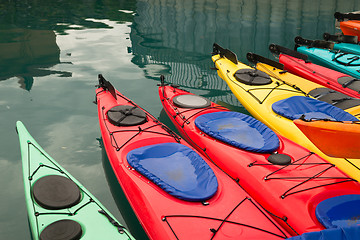 Image showing Kayaks in Multiple Color Float Marine Harbor