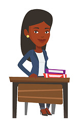 Image showing African-american student sitting at the desk.