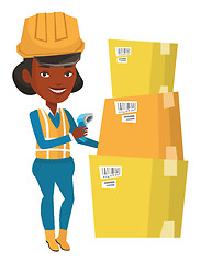 Image showing Warehouse worker scanning barcode on box.