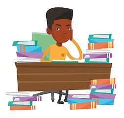 Image showing Student sitting at the table with piles of books.