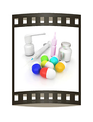 Image showing Syringe, tablet, pill jar. 3D illustration. The film strip