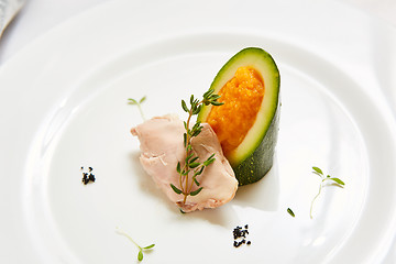 Image showing Steamed chicken fillet and vegetables. Shallow dof.