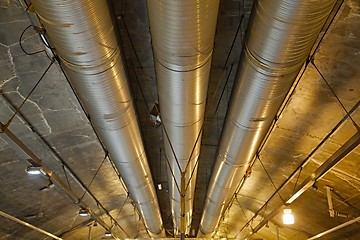 Image showing Industrial pipelines in a tunnel