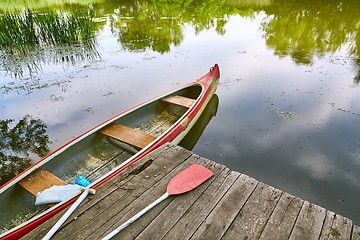 Image showing Canoe on the riverside