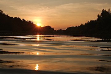 Image showing Sunset over a river