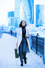 Image showing Beautiful woman in a light coat