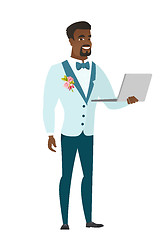 Image showing Groom using laptop vector illustration.
