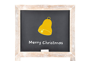 Image showing Christmas greetings with bell on blackboard