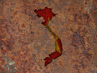 Image showing Map and flag of Vietnam on rusty metal