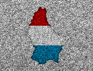 Image showing Map and flag of Luxembourg on poppy seeds