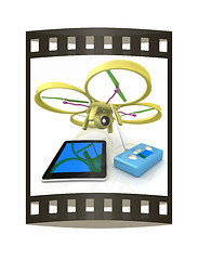 Image showing Drone, remote controller and tablet PC. The film strip