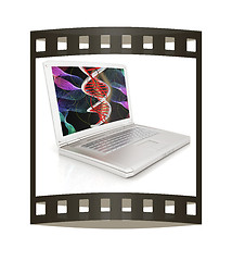 Image showing Laptop with dna medical model background on laptop screen. 3d il