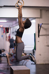 Image showing black woman doing dipping exercise