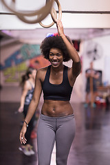 Image showing black woman doing dipping exercise