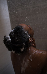 Image showing African American woman in the shower