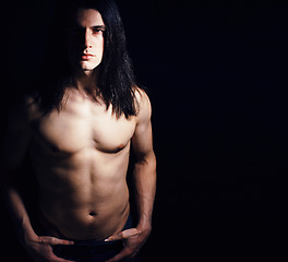 Image showing handsome young man with long hair naked torso