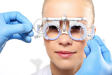 Image showing Selection of spectacles, woman ophthalmologist.