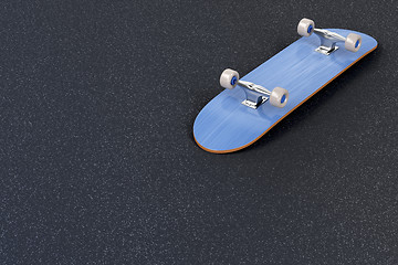 Image showing Skateboard on asphalt 