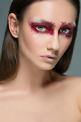 Image showing Beautiful woman face portrait close up with red make up