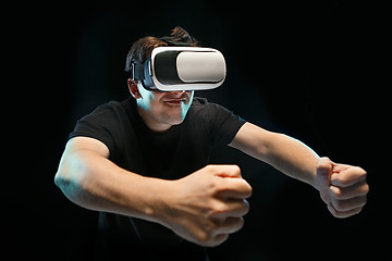 Image showing The man with glasses of virtual reality. Future technology concept.