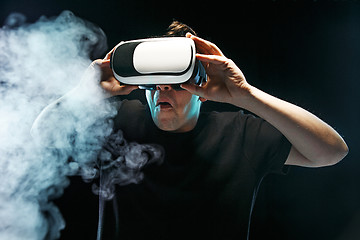 Image showing The man with glasses of virtual reality. Future technology concept.