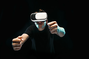 Image showing The man with glasses of virtual reality. Future technology concept.