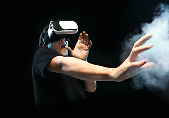 Image showing The man with glasses of virtual reality. Future technology concept.