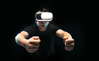 Image showing The man with glasses of virtual reality. Future technology concept.