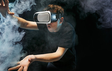 Image showing The man with glasses of virtual reality. Future technology concept.