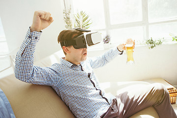 Image showing The man with glasses of virtual reality. Future technology concept.