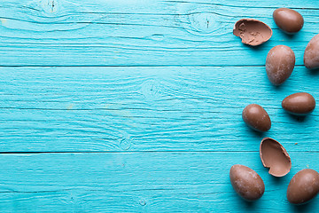 Image showing Chocolate eggs on blue background