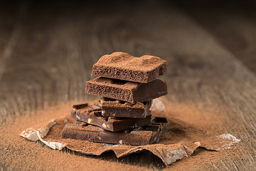 Image showing Pyramid of chocolate on table