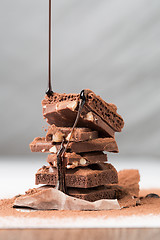 Image showing Tower of chocolate, porous, nuts