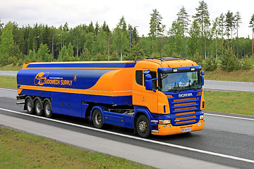 Image showing Blue and Yellow Scania Semi Tank Truck Transport