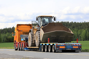 Image showing Semi Trailer Hauls Large Cat Wheel Loader